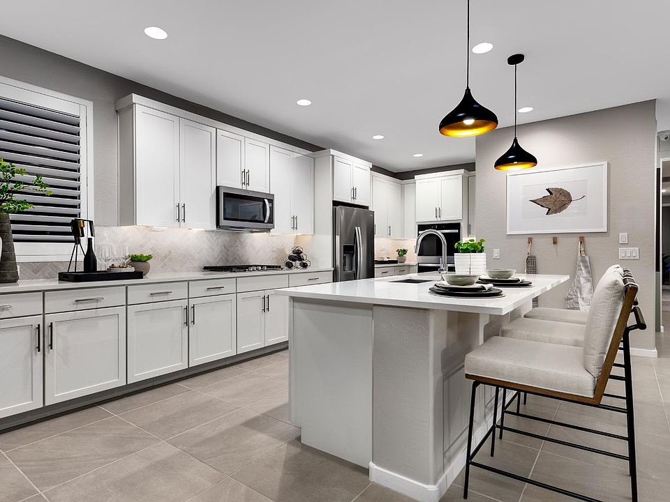 An image of the kitchen in the Lily model home at Mariposa in Blossom Rock.