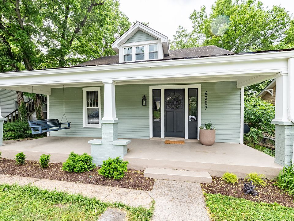 Front porch with swing, Landscaping and yard cared for by Landlord