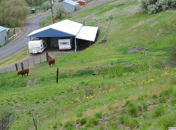 Shop & pasture below house