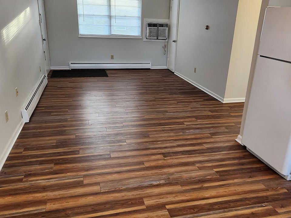 Large living room, with coat closet, off kitchen
