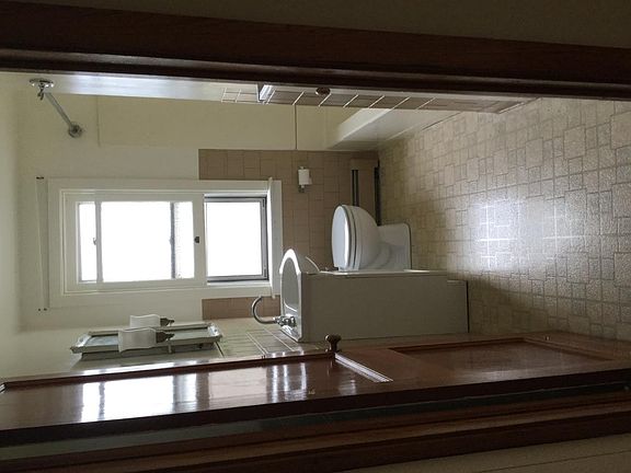 128 W York street bathroom. Shower and bath tub.