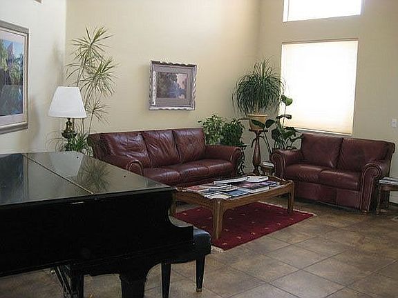 Living room. Vaulted ceiling and fans not visible