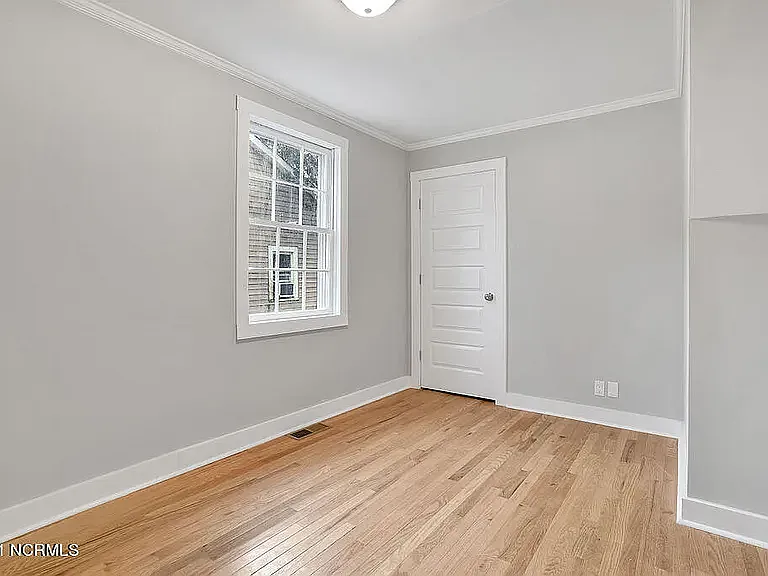*original listing photo from when we purchased the home (downstairs bedroom #2)