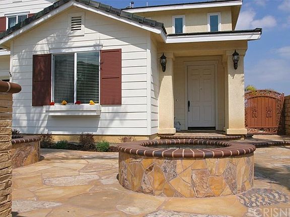 Close view of fountain base at entry courtyard.