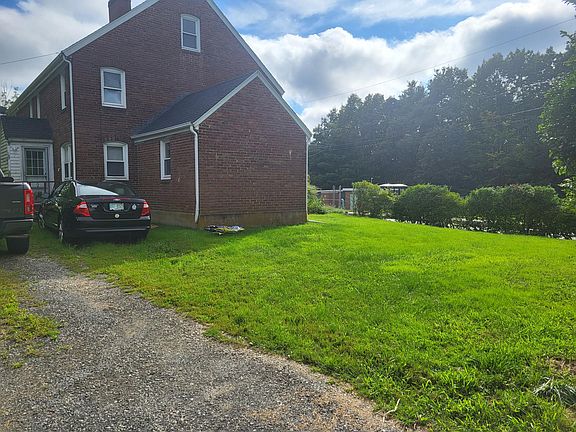 Driveway and side yard.