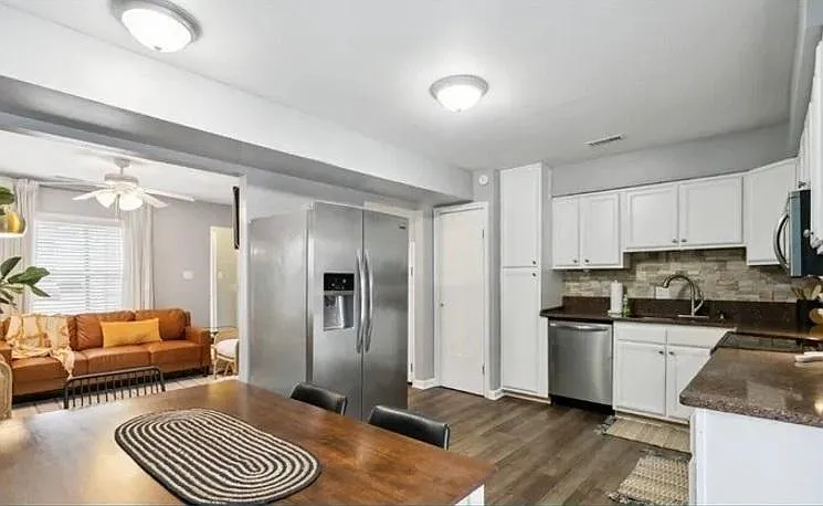 Kitchen viewpoint standing at the French (back) doors - 1057 Coastaway Dr