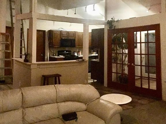 living room eating bar and looking into kitchen