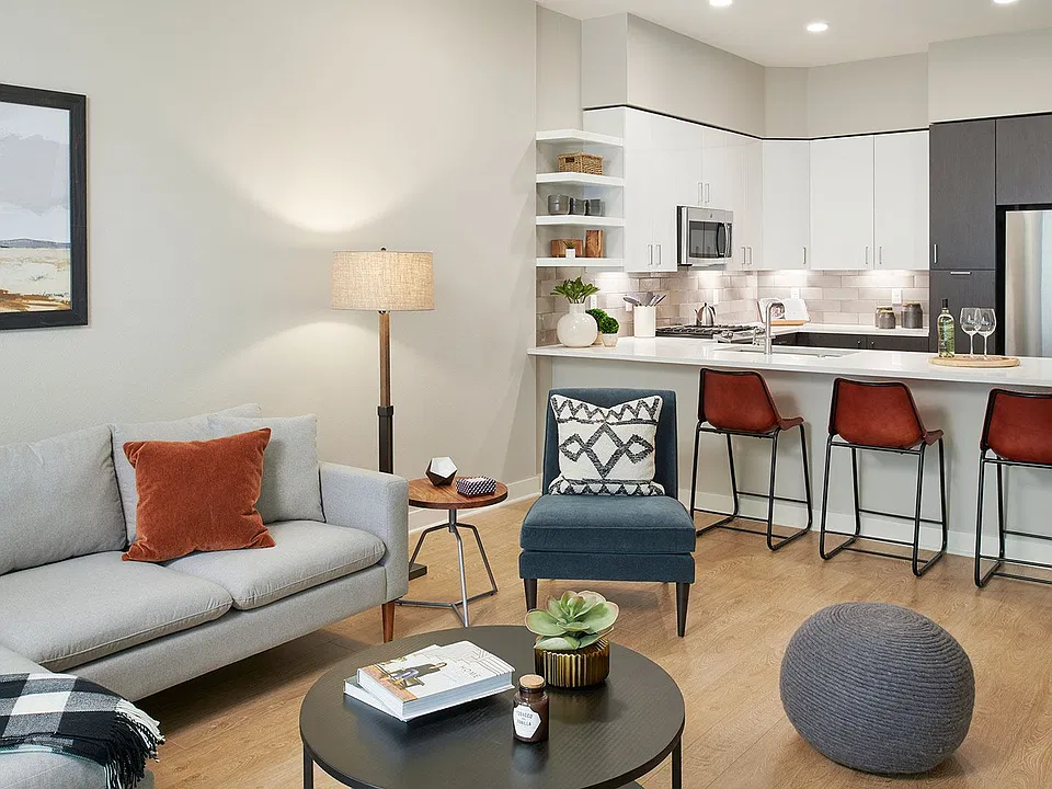An open-concept layout brings the kitchen and living area together in a bright, flexible space made for everyday comfort and easy entertaining.