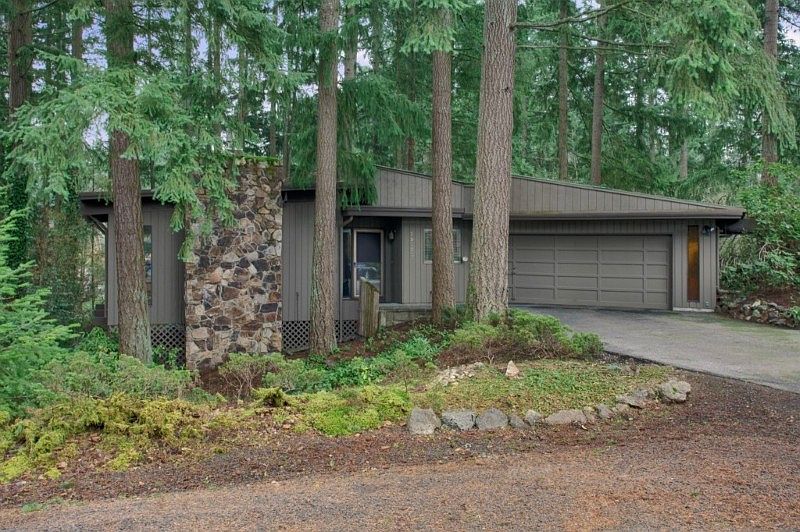 Enjoy contemporary rambler in northwest setting!
