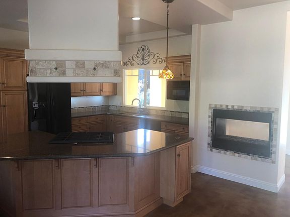 Island kitchen with see through fireplace