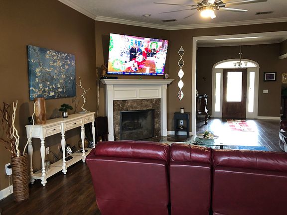 Living w/ 75” TV over firplc