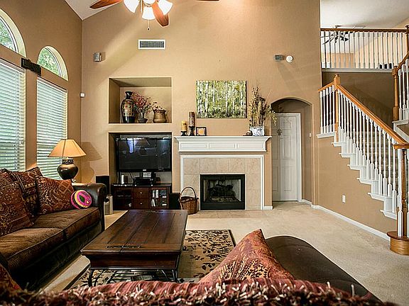 Spacious great room with large windows.