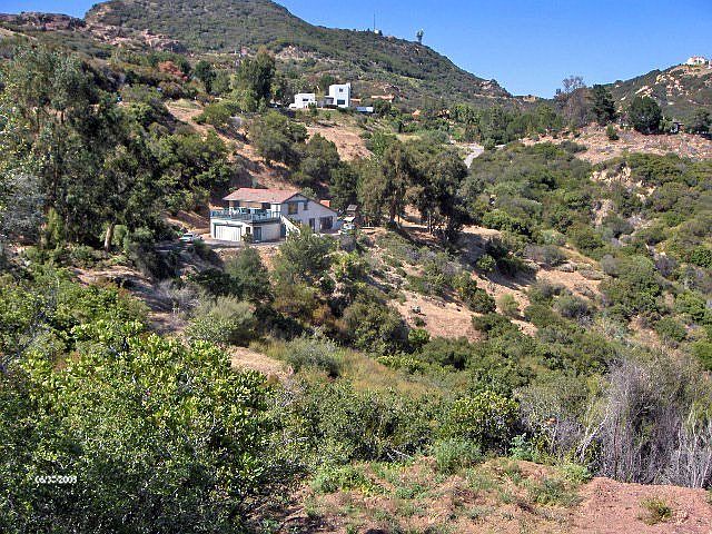 View of home and acreage