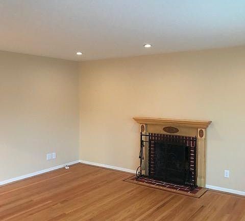 Livingroom facing inside of house (w/ recessed lights in ceiling)