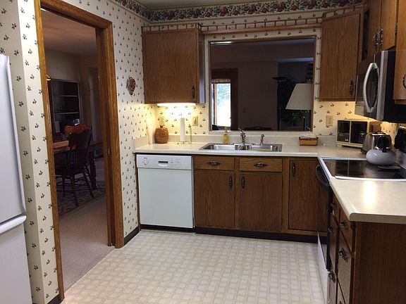 Kitchen, dining room through the door on left.  Laundry room