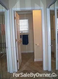 Master bath
						:
						Entrance to master bath. Two large closets, linen closet and bath room beyond