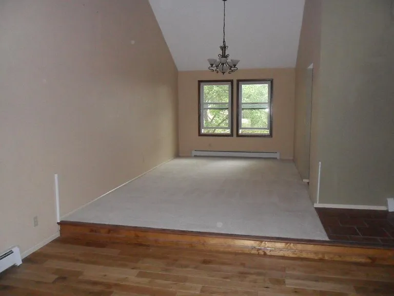 Dining room next to sunken living room