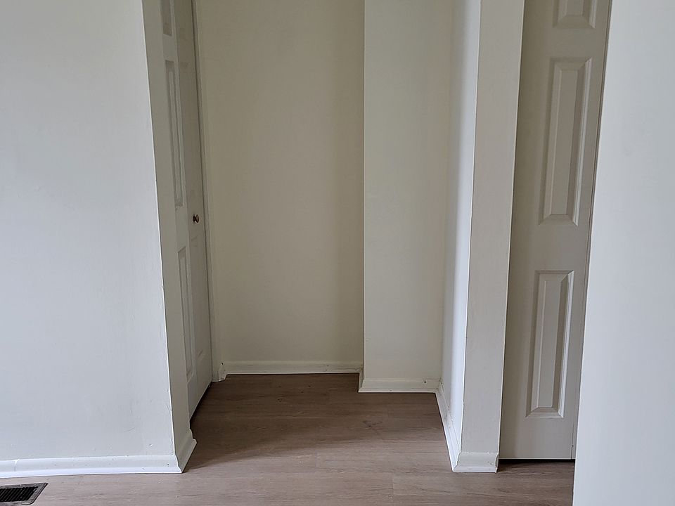 Closets on left is under stairs. Closet on right is across from bathroom.