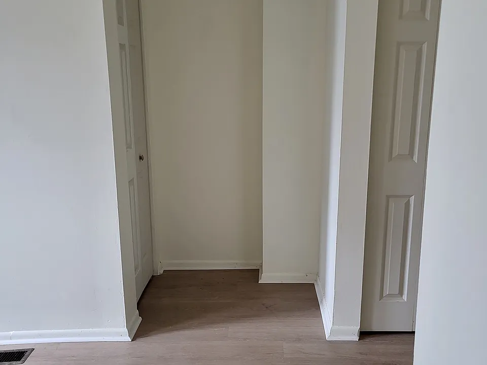 Closets on left is under stairs. Closet on right is across from bathroom.