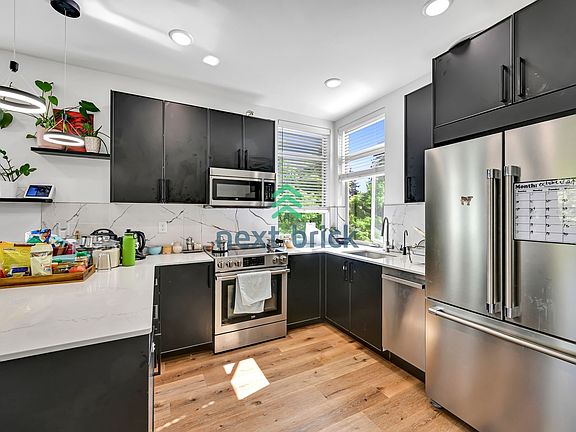 5th image of 12311 15th Ave NE #A