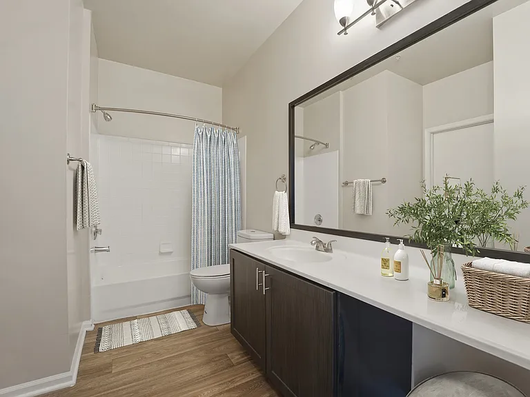Step into a world of comfort at Eagle Rock Apartments at Belcamp. This stylish bathroom features a modern design with sleek fixtures and ample storage. Elevate your daily routine in this serene space. Schedule a tour today to see it all!