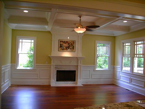 Coffered Ceilings, Gorgeous Fireplace and Brazilian Teak Hardwood Floors.