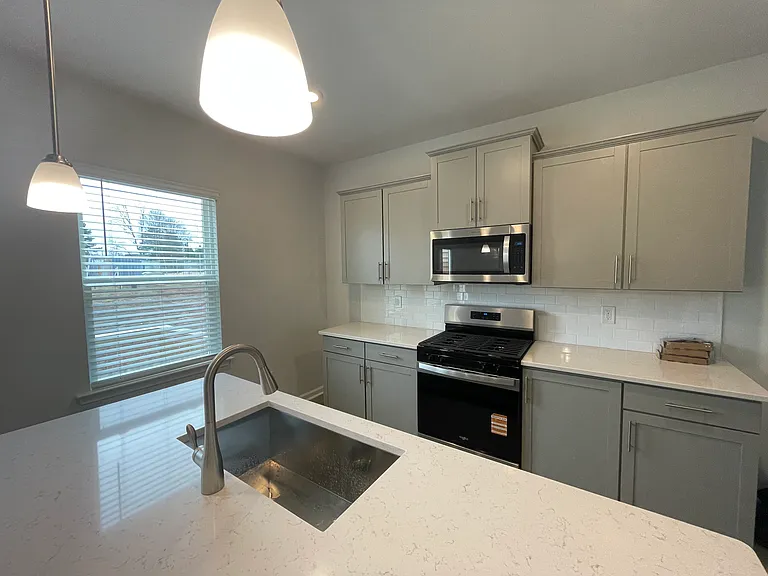 Modern open-concept kitchen with large island (shared)