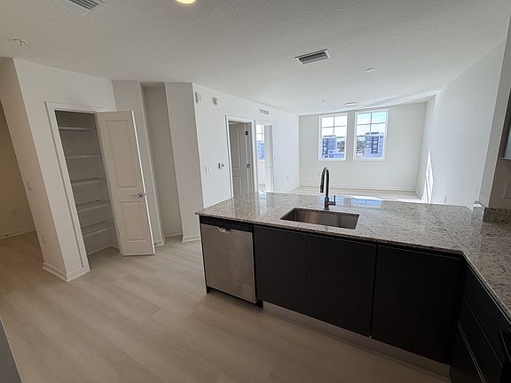 5th image of 5587 Millenia Blvd #503
