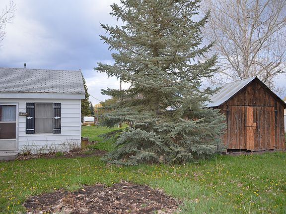 Front View with Storage Shed
