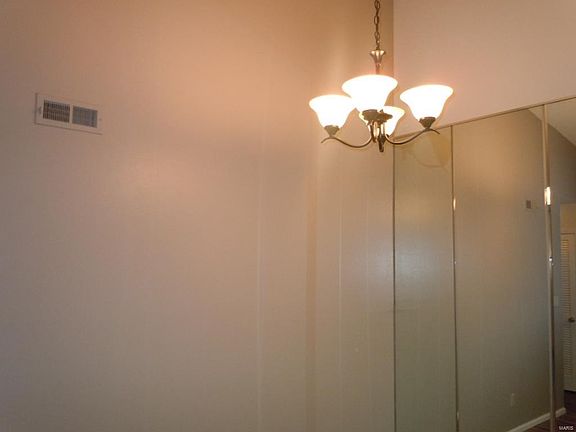 New light fixture in dining room.