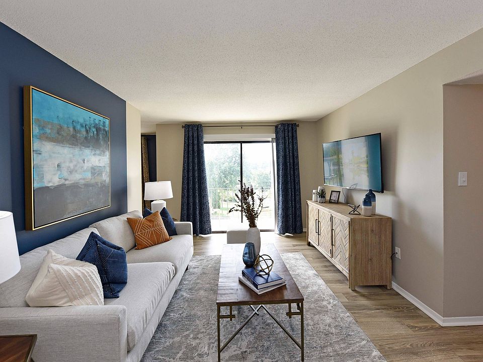 Spacious living room with hardwood-style flooring
