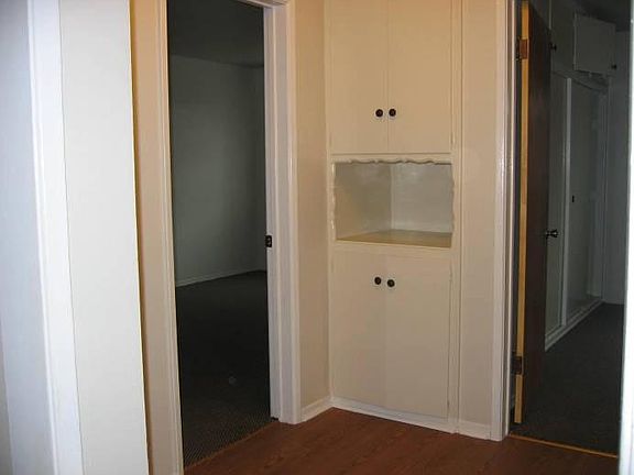 Hallway with linen closet