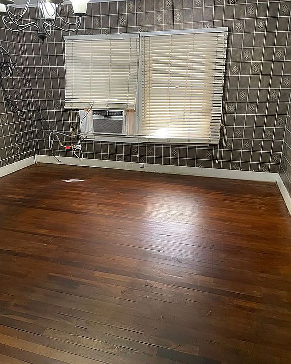 Bedroom with hardwood floor 