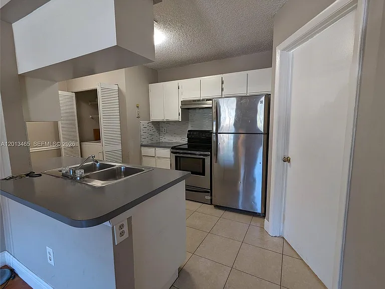 18308 NW 68th Ave #D — Photo 4