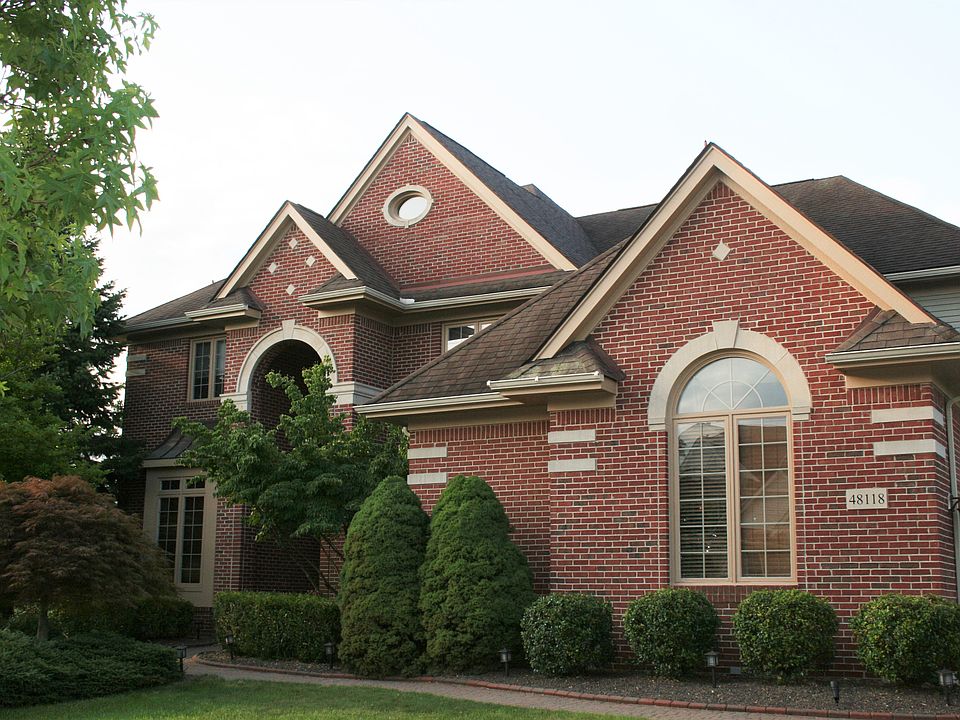 Brick with limestone accents