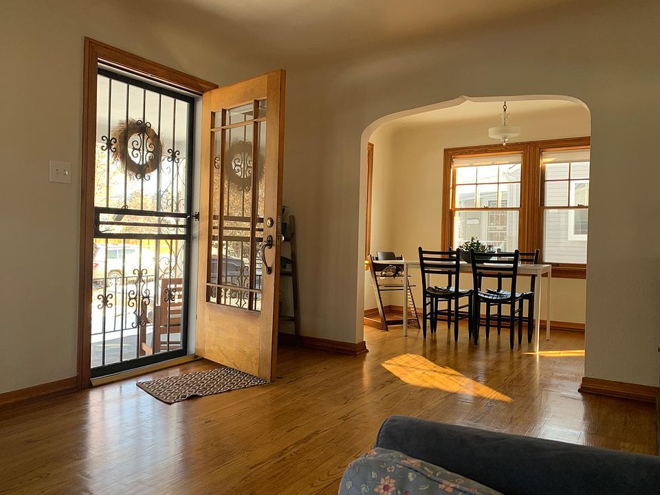 Entry way and Dinning Room. Beautiful wood floors and trim.