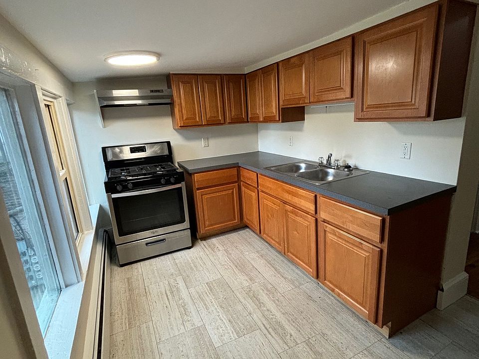 Large kitchen with lots of windows
