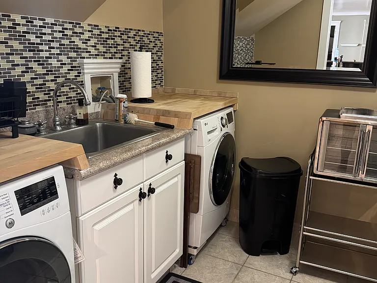 Pantry-Laundry Room - Left washer-dryer
