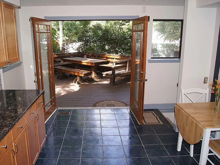 French doors open to deck