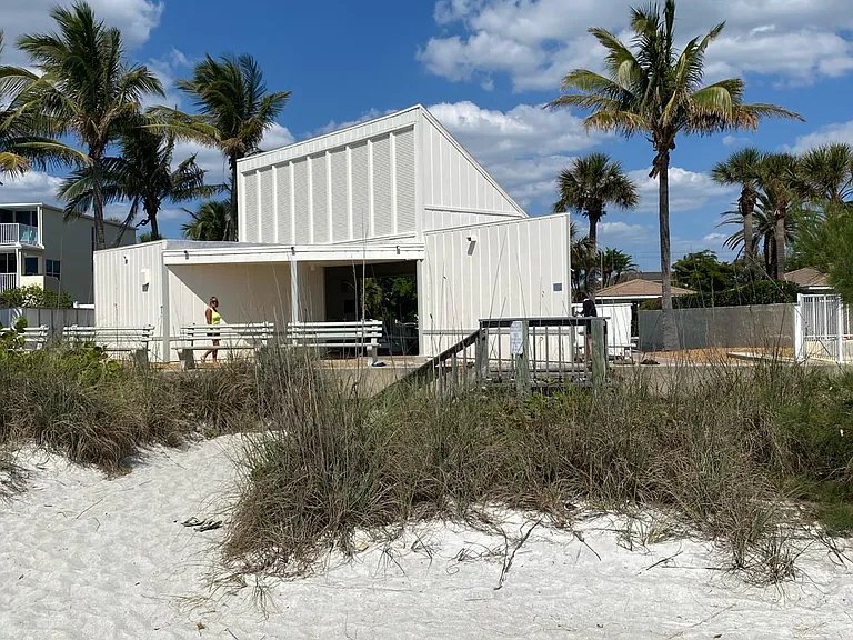 Private beach pavilion with washrooms and showers. Just steps from the condo. As well as dedicated parking for owners/renters.
