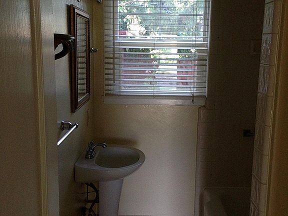 Bathroom with tub/shower combination.