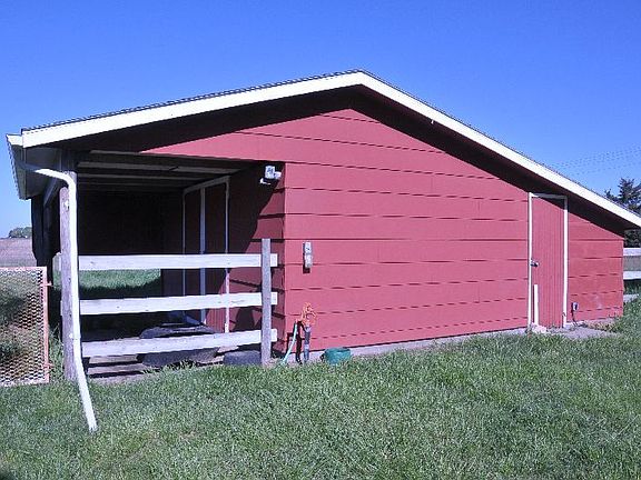 Barn : Barn with storage and two stalls. Newly painted. Shed on property also.
