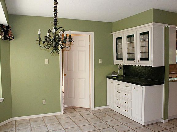 Light and bright breakfast area with built-ins for more storage space.