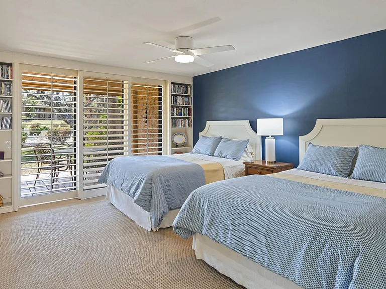 bedroom 1 with 2 queen beds