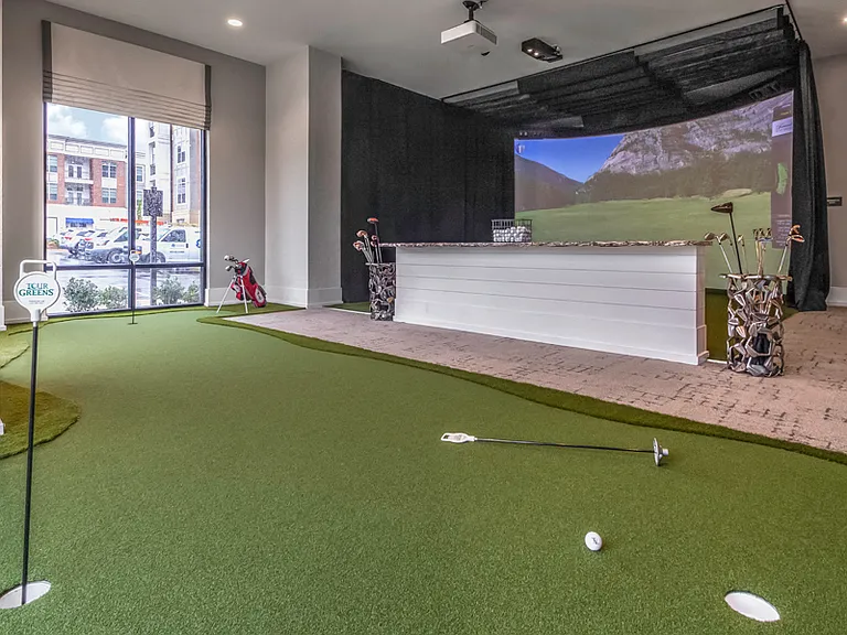 Virtual golf and putting green located in the Sports Lounge