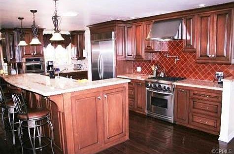 View of Gourmet Kitchen, Granite Island, Extensive Storage Cabin