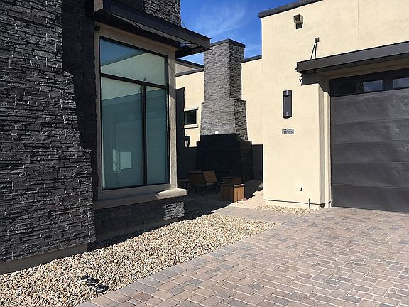 courtyard w/stone chimney