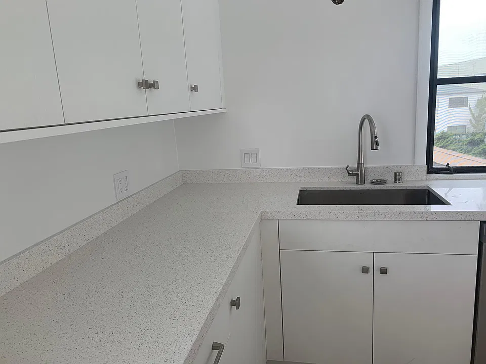 WEST AND NORTH SIDES OF KITCHEN