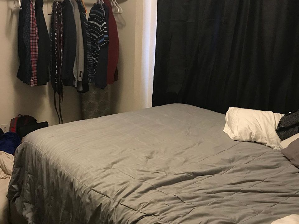 There is more space to the side of the bed. About 2-3 feet w