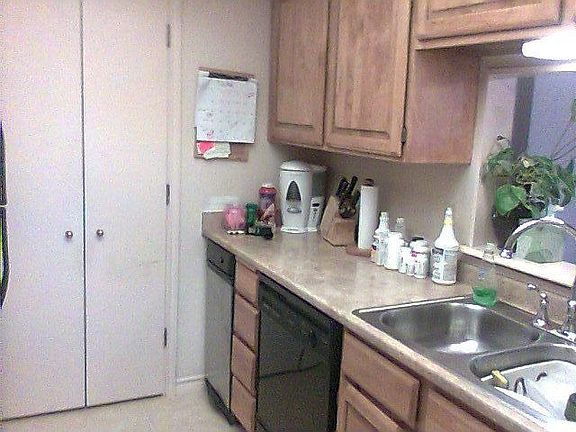 Updated kitchen with new countertops, cabinets and appliances.